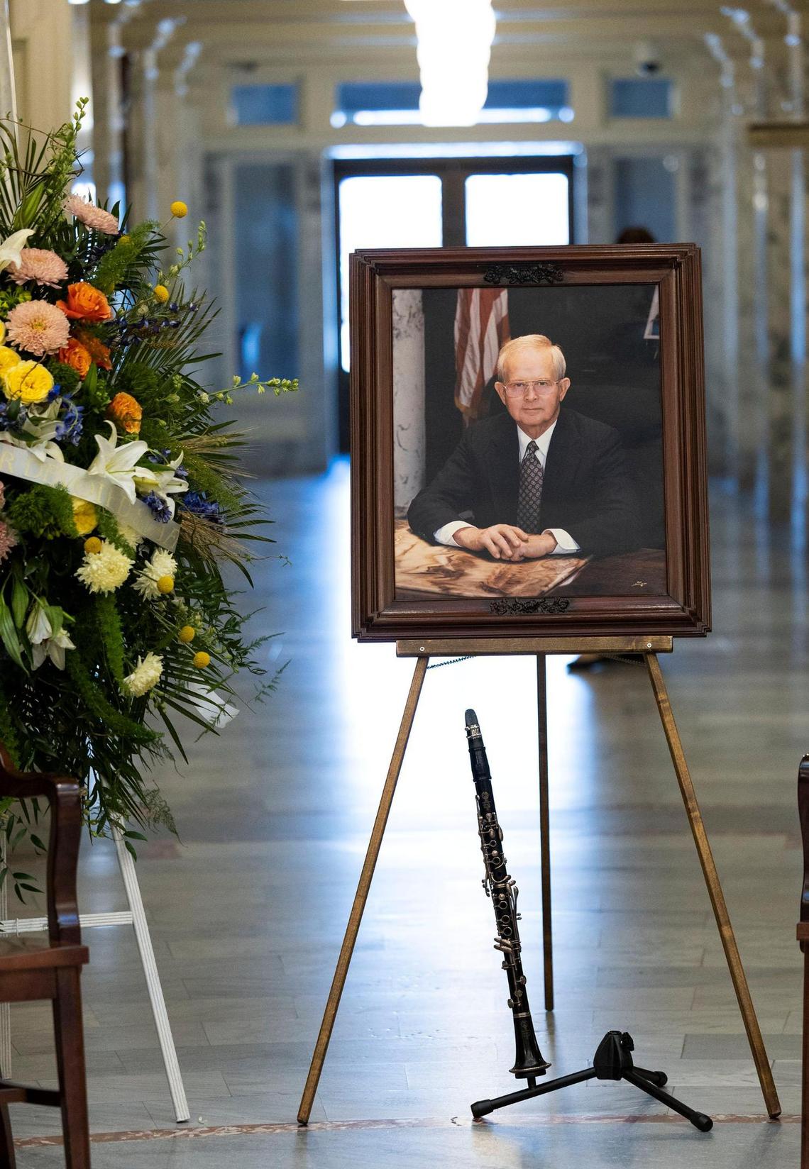 A portrait of former Idaho Gov. Phil Batt was placed in the Idaho Statehouse rotunda with his clarinet. Friends, family and dignitaries honored the life of Gov. Batt, Thursday, March 9, 2023, at the Idaho Statehouse in Boise.