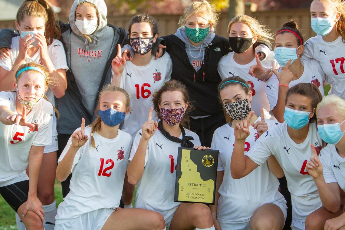 Boise High School’s 5A district championship photo in the time of coronavirus. beat Rocky Mountain 2-1 to win the 5A girls district soccer trophy on Wednesday, Oct. 14, 2020 at Mountain View High School.