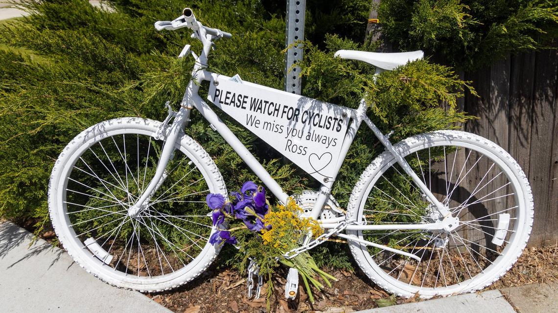 A memorial bicycle on McMillan Road in Boise marks the spot where Ross Dodge was severely injured in a crash with a vehicle in 2010. Dodge died in 2021 related to his injuries.