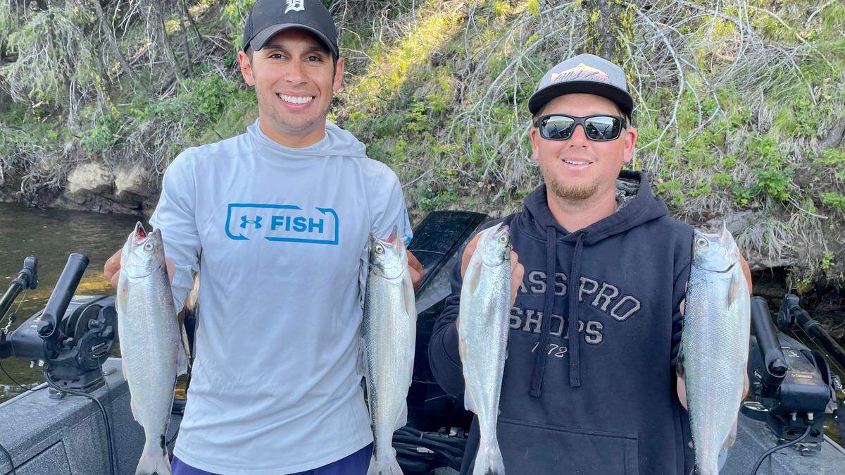 Kokanee salmon have made a comeback at Payette Lake . Here, columnist Jordan Rodriguez and outfitter Kyle Sandy show off some nice keepers caught on a July morning in McCall. 
