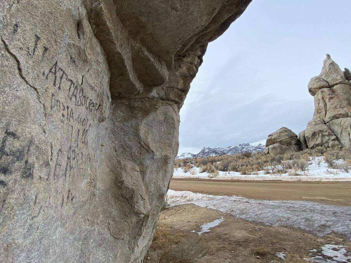 Camp Rock at City of Rocks National Reserve in Idaho features dozens of emigrant signatures, like the one shown here. Travelers on the California Trail in the mid-1800s signed their names in axle grease or etched them into the rock.