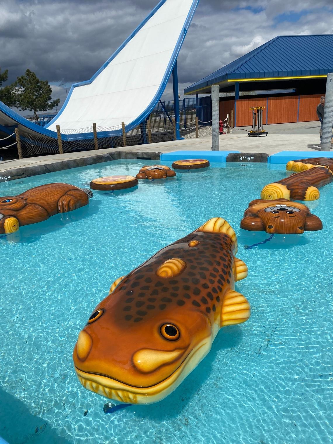 Critter Crossing, one of three new attractions at Roaring Springs Water Park, features fish, log and beaver-themed floats that guests can cross using overhead ropes. The expansion will open May 31.