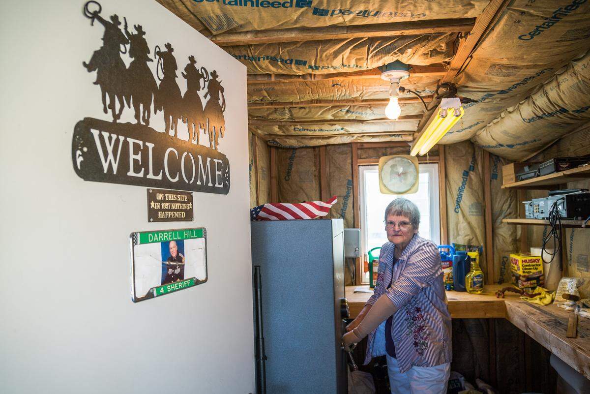 After Darrell Hill was diagnosed with dementia, Dee Hill locked his guns in a vault in the carport of their home.
