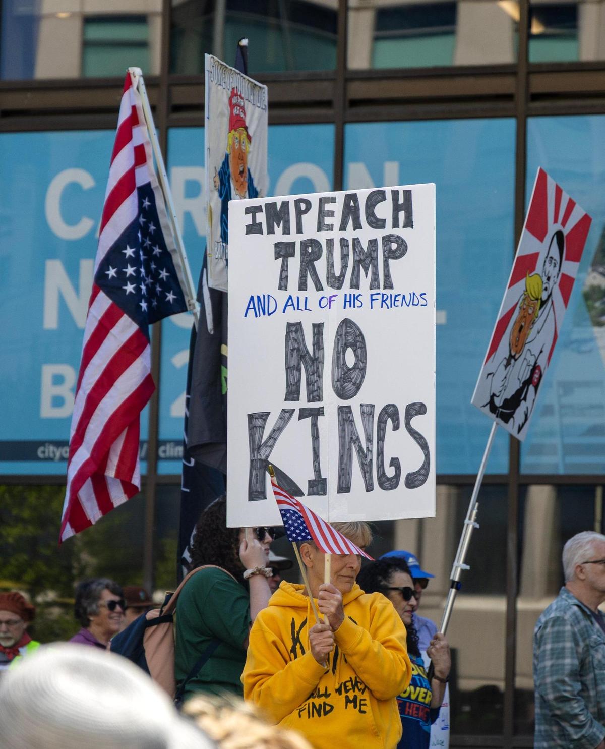 People gather for a May Day protest of Trump and his immigration and labor policies and Elon Musk’s DOGE cuts held at Boise City Hall, Thursday, May 1, 2025.
