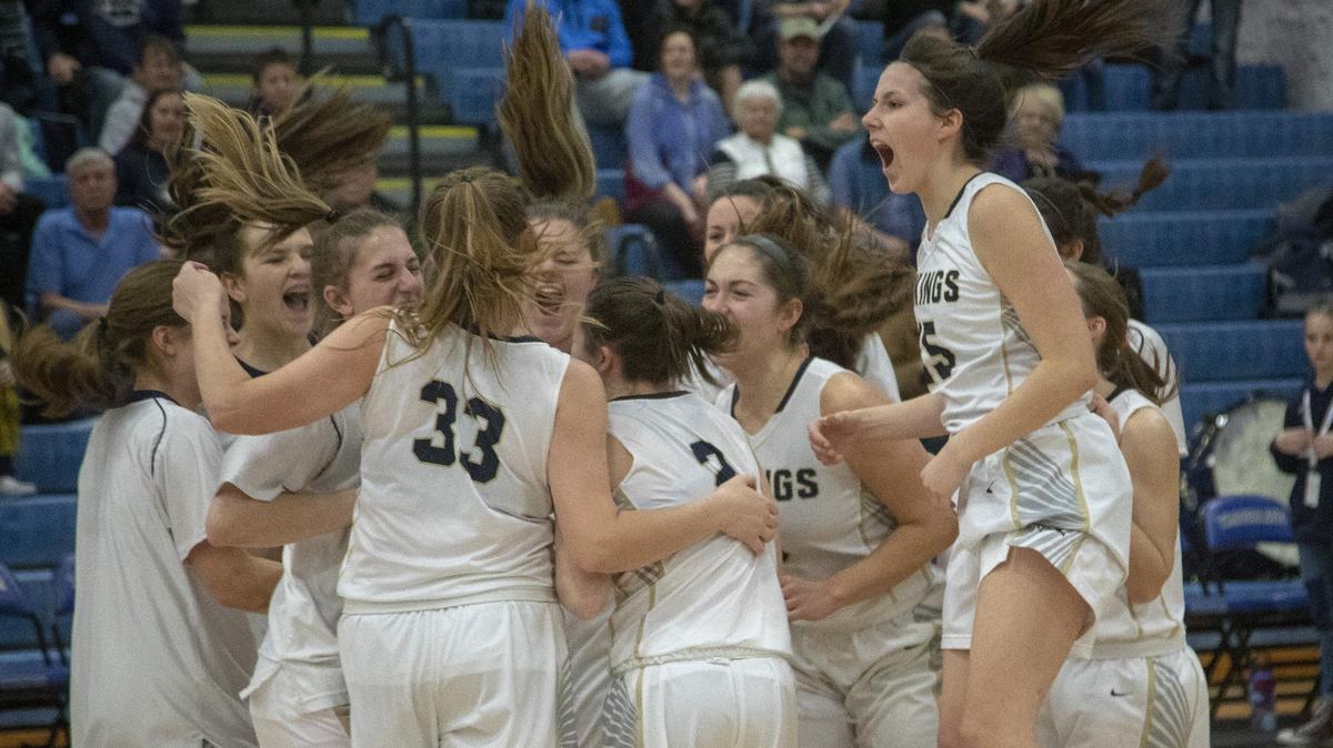 Top-ranked Middleton is exuberant early in the game as they take the lead over Mountain Home. Middleton advances after their 44-36 win in the first round of the 4A state girls basketball championship at Timberline High School on Thursday, Feb. 14, 2019.