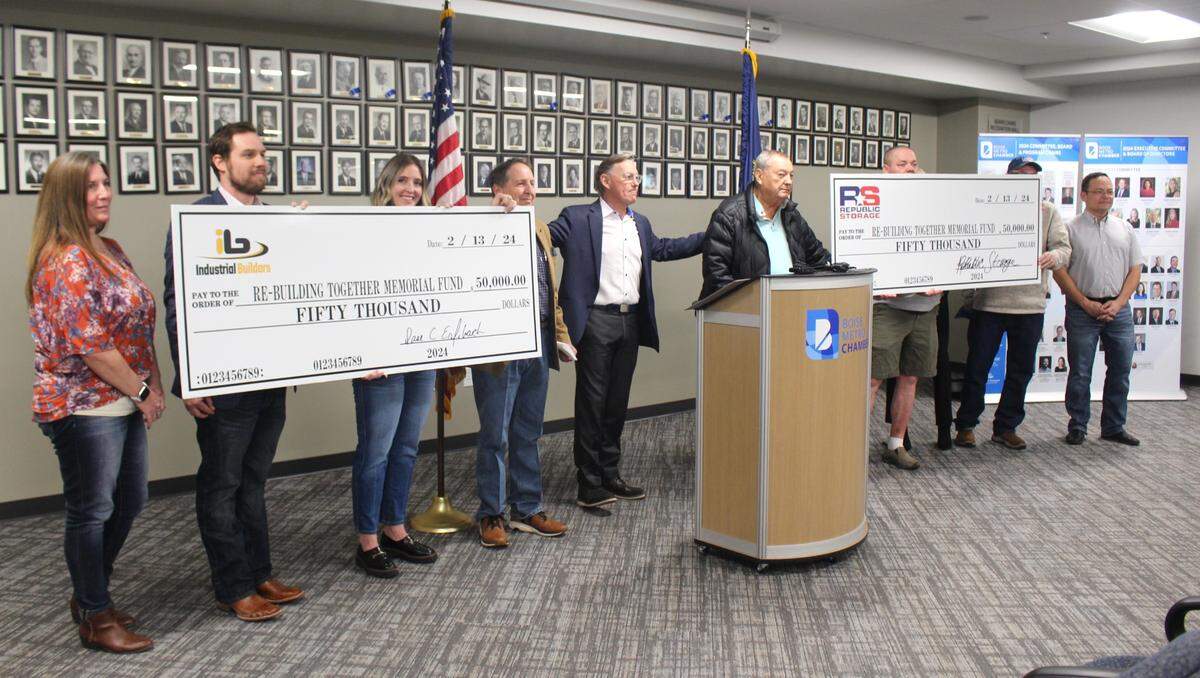 Two $50,000 checks were announced at a news conference Thursday marking the start of a fund-raising drive to help victims of the hangar collapse in Boise.