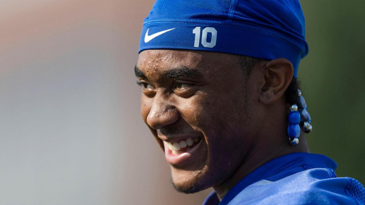Boise State quarterback Taylen Green takes a hydration break between fall camp drills in August. The Broncos open the season Saturday.