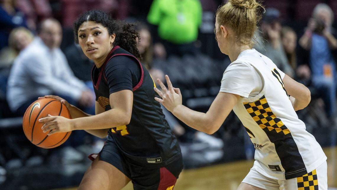 Columbia guard Yani Lincoln pushes the ball upcourt during the 5A District Three championship on Feb. 13 at Idaho Central Arena in Downtown Boise. 