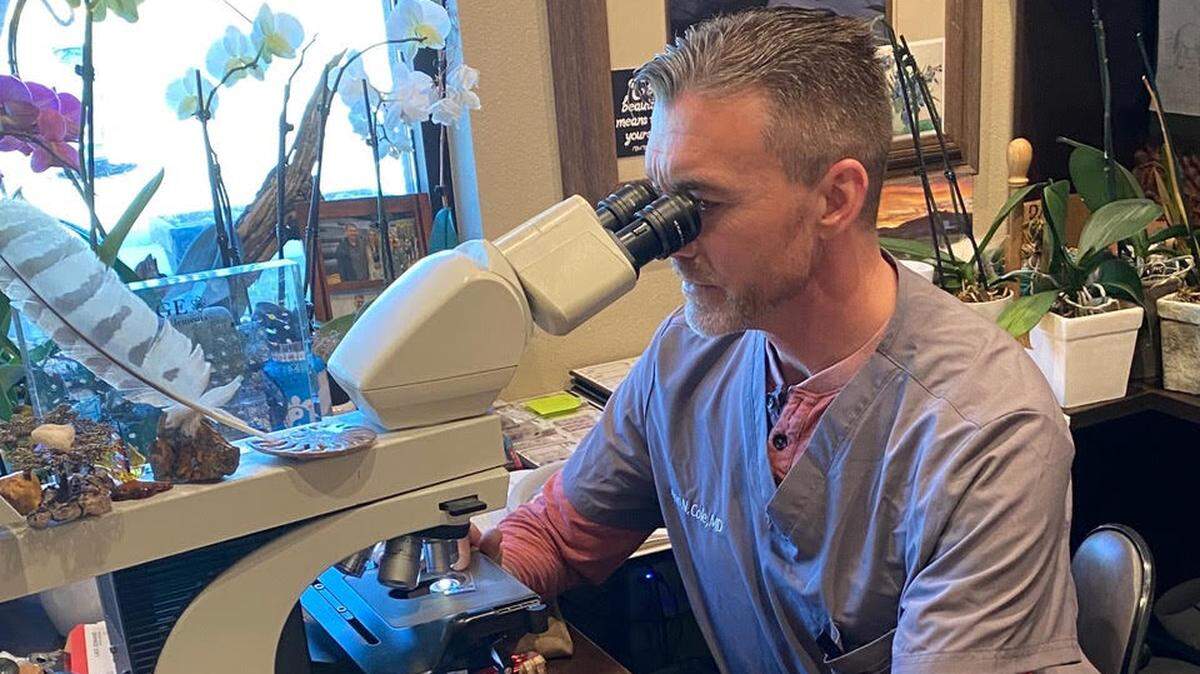 A woman has filed a medical malpractice lawsuit against Dr. Ryan Cole, a local pathologist, after she received a misdiagnosis of endometrial cancer and underwent invasive surgery to remove her reproductive organs.