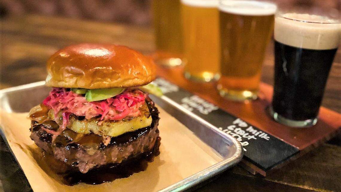 The half-pound Maui Wowie Burger and a beer flight at Sid’s Garage.