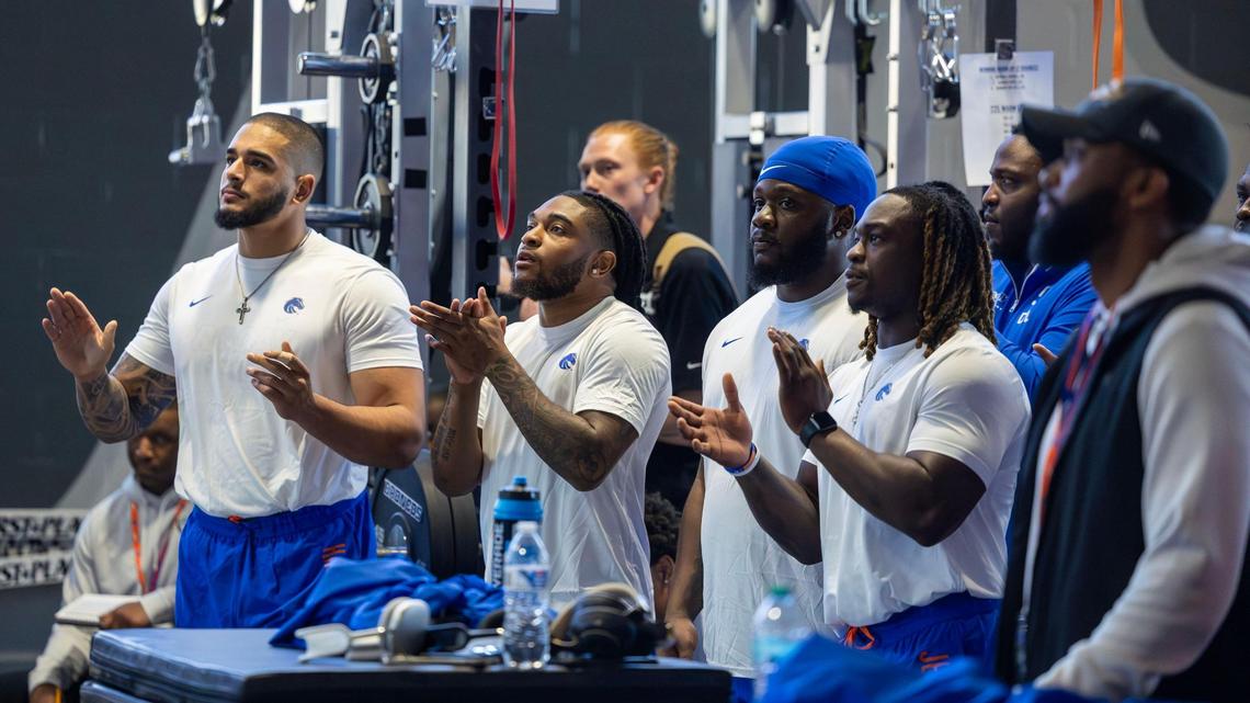 Boise State Broncos participating at Pro Day cheer on a teammate as NFL scouts take notes in Boise, Wednesday, March 26, 2025.