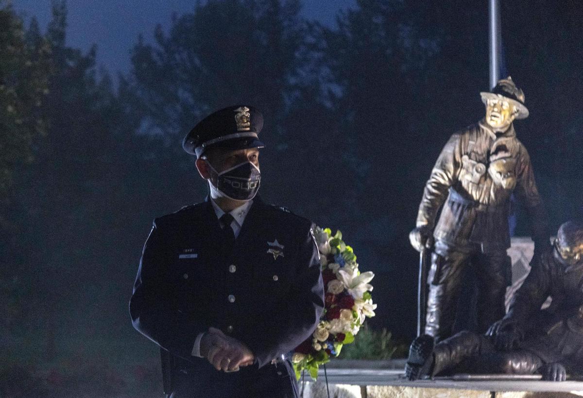 Boise Police Chief Ryan Lee speaks at the Idaho Fallen Firefighters Memorial for a ceremony to remember the lives lost during the 9/11 attacks 20 years ago. The memorial grounds house a 10-foot beam from the World Trade Center.