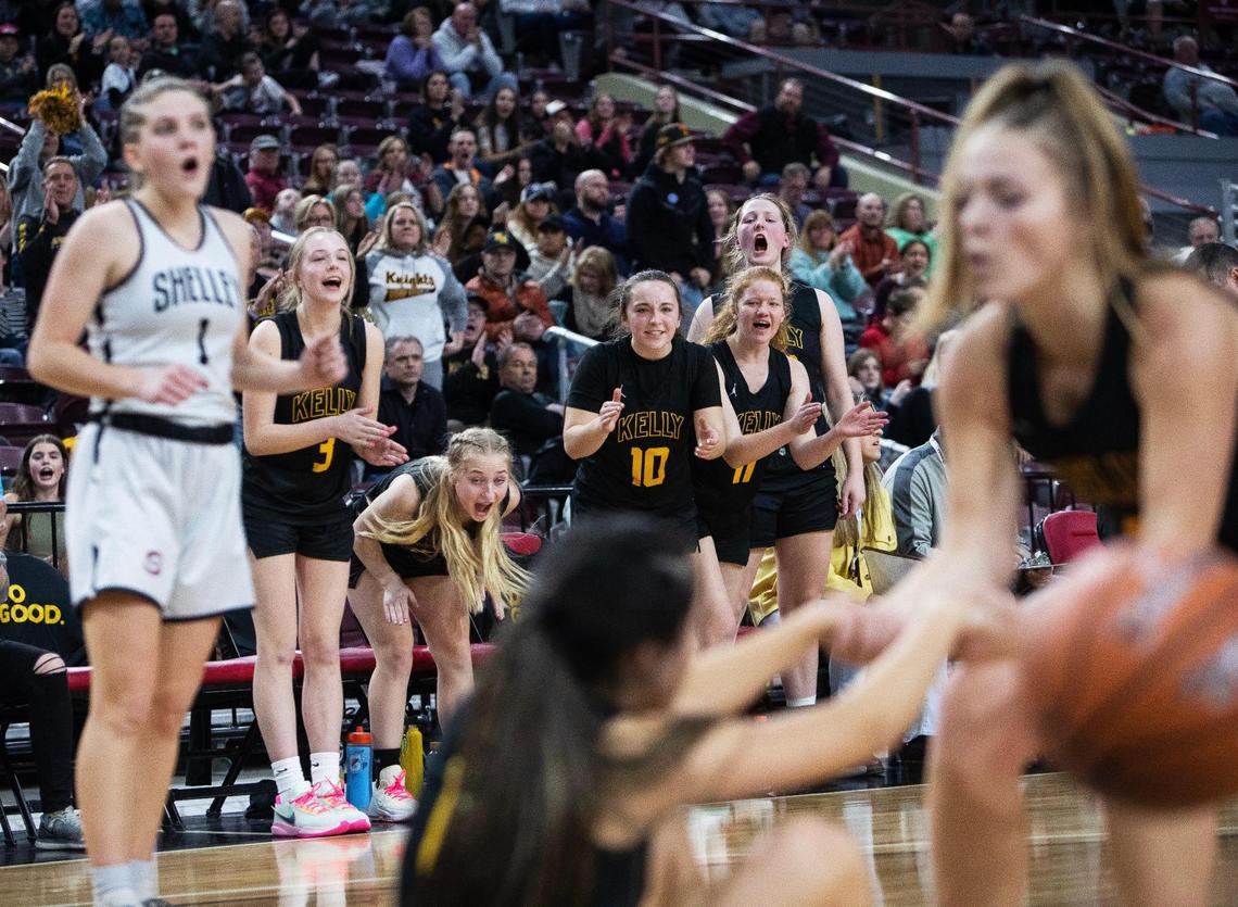 The Bishop Kelly bench reacts after junior Keira Lizama is fouled by Shelley during the fourth quarter in the 4A girls basketball state semifinals Friday at Ford Idaho Center in Nampa.