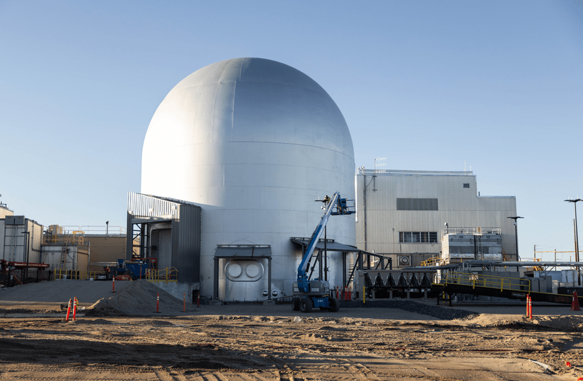 The Idaho National Laboratory unveiled a domed site for private reactor testing in 2026. A Nuclear Lifecycle Innovation Campus would bring more companies to the site.