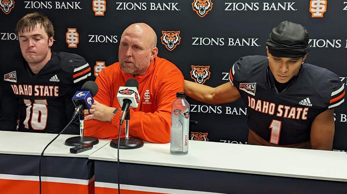 Idaho State University quarterback Sagan Gronauer, left, and wide receiver Xavier Guillory address media with head coach Charlie Ragle after a loss to Montana on Oct. 1.