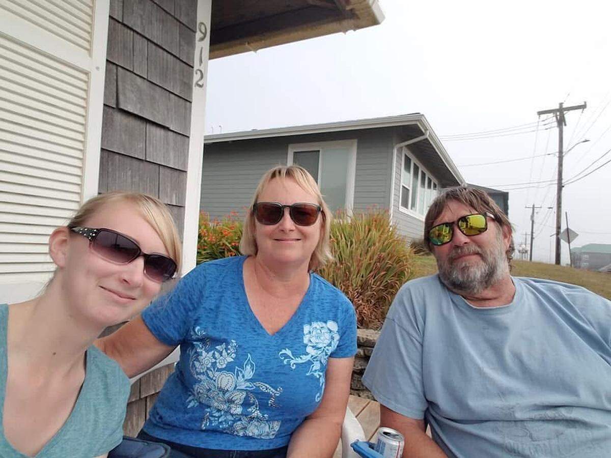 Jerica Harper, left, with her parents, Donna and Kelly Jenks. The Jenks were shot and killed in their southern Idaho home July 8, along two other people who were killed in a neighboring county.