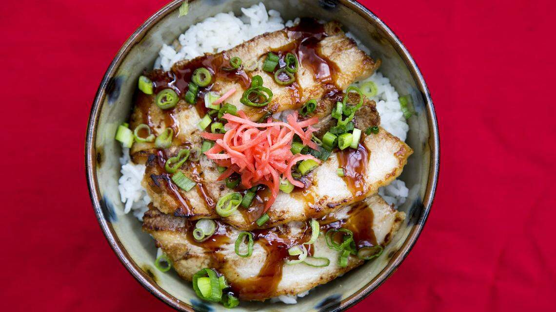 This rice pork belly bowl with scallions and pickled ginger was served at Ramen Sho in Boise.
