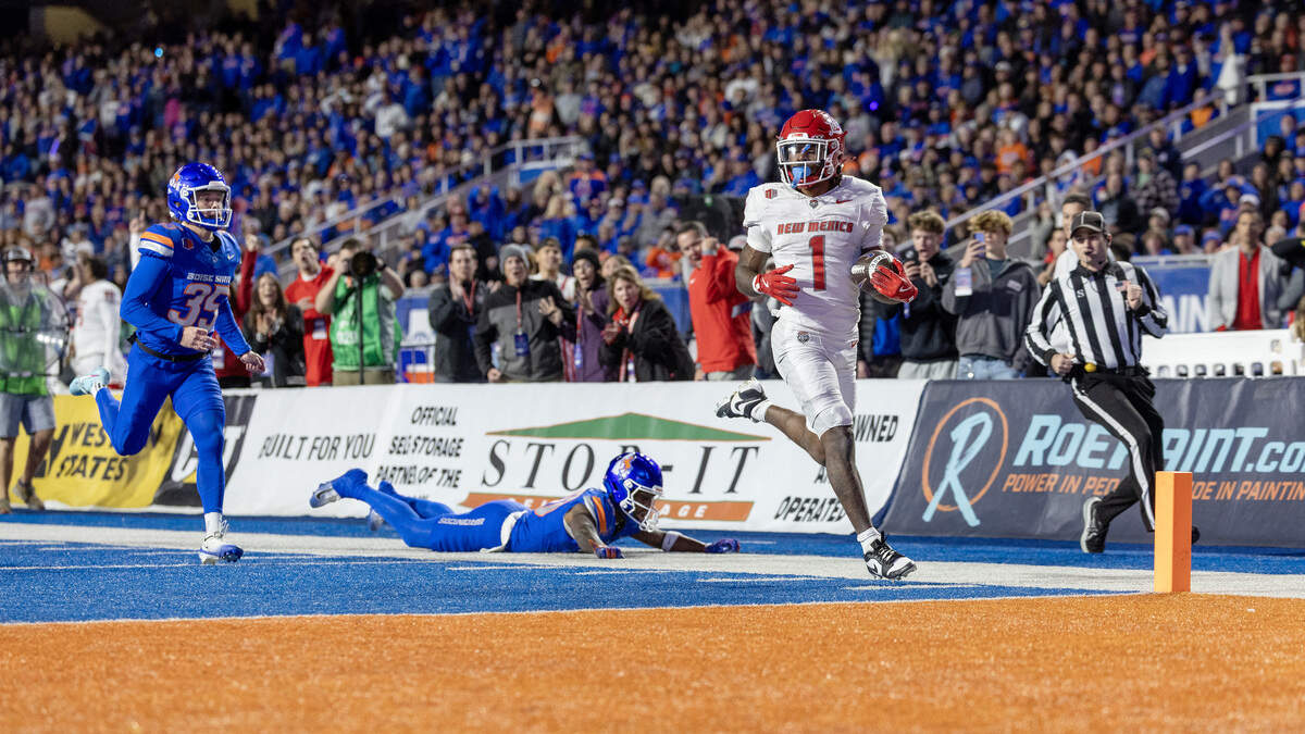 New Mexico’s Damon Bankston trots into the end zone at the end of a 100-yard touchdown return on a kickoff against Boise State last weekend.