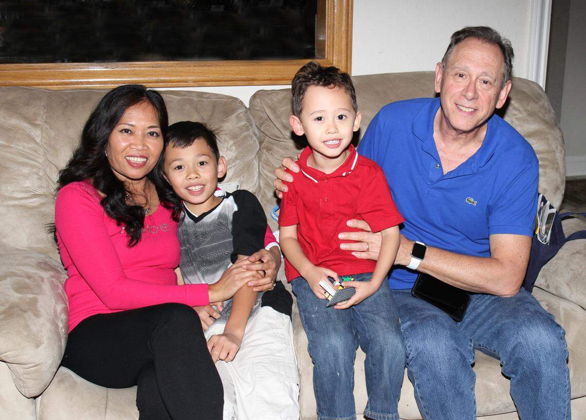 James Bennett, right, with his wife, Anilea, and their two children, Andrew and Joshua.