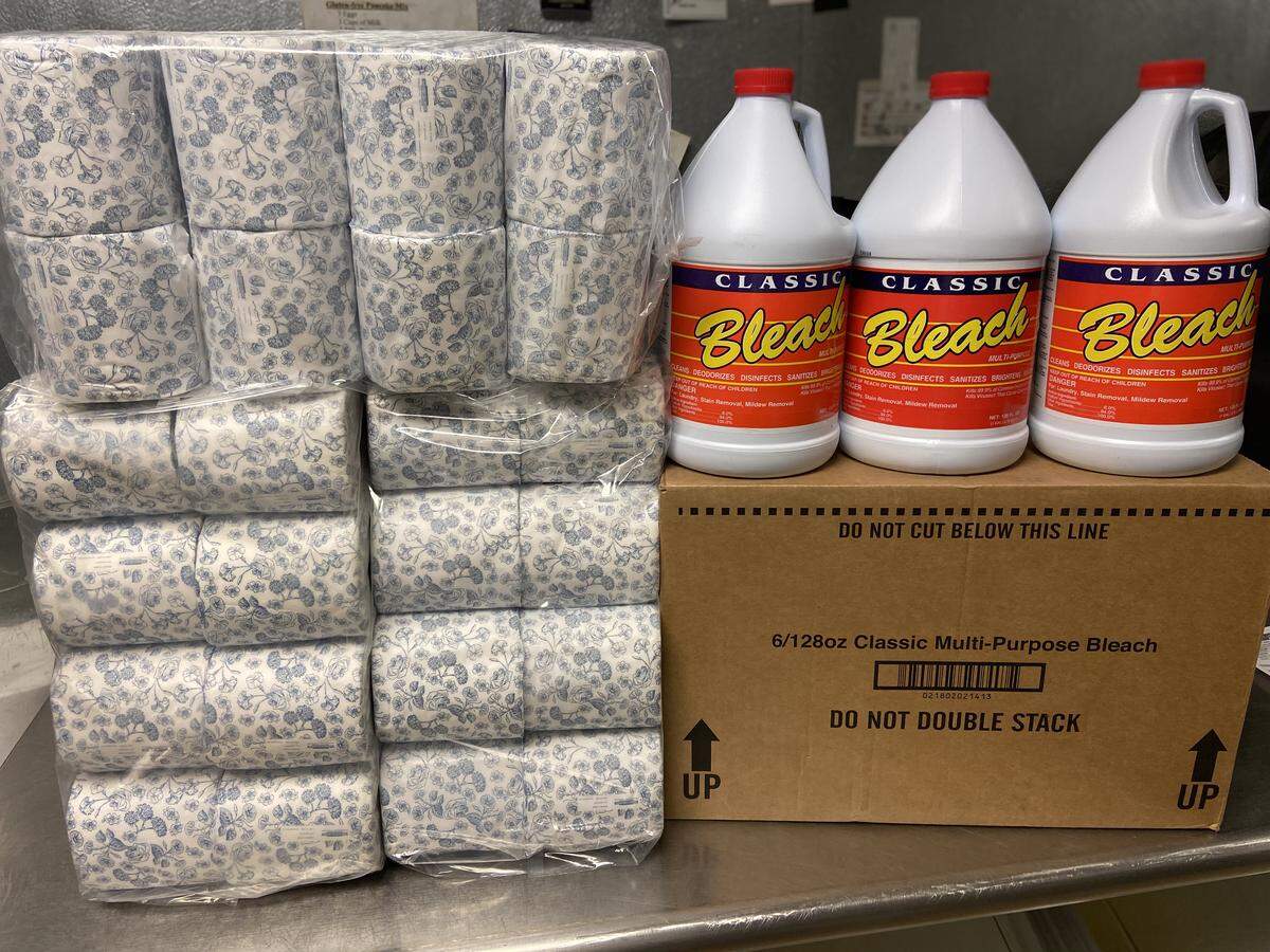 Toilet paper and bleach stacked for customers to purchase and pick up at the Original Pancake House in Boise.