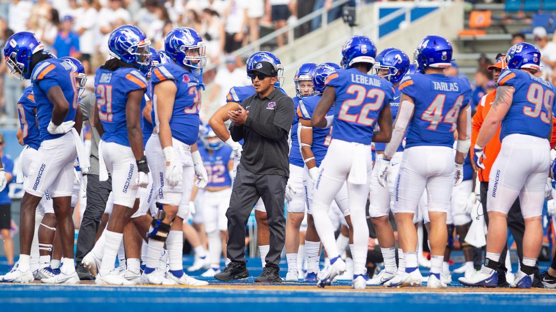 Boise State football coach Andy Avalos gathers his players during the Broncos’ home opener against UT Martin.