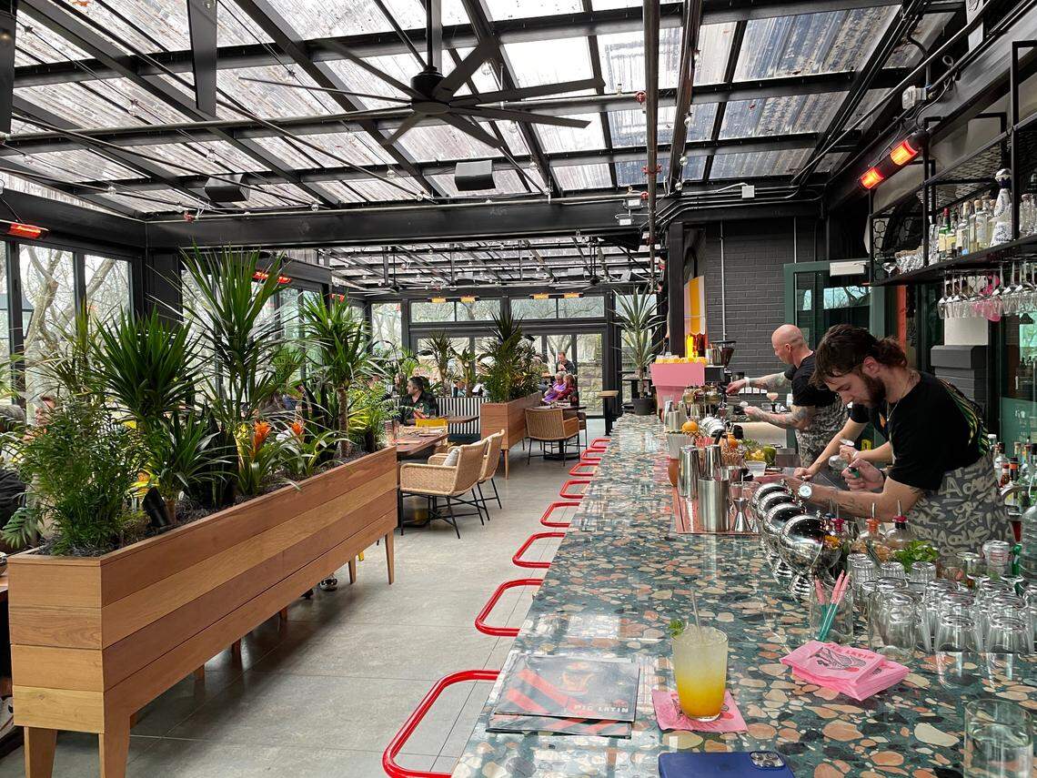 An attractive covered patio is part of the allure of Pig Latin, which took over the former Bella Aquila spot.