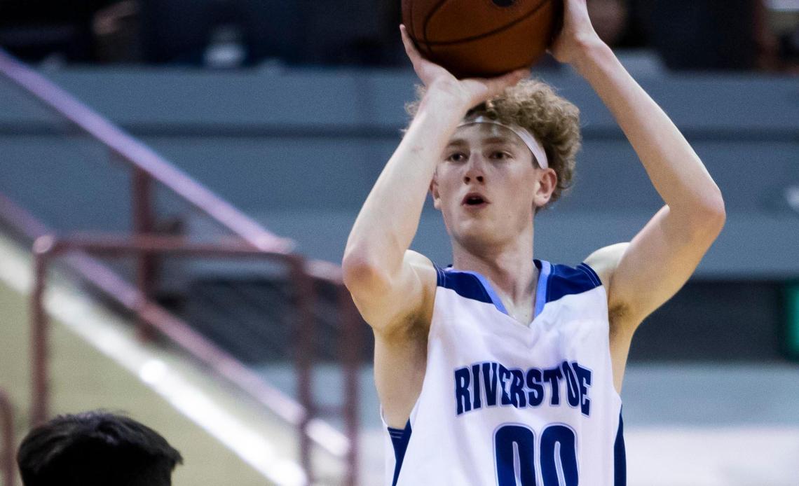 Riverstone forward Charlie DeBoer lines up a a 3-pointer against Lapwai in the 1A Division I state championship March 5 at the Ford Idaho Center in Nampa.