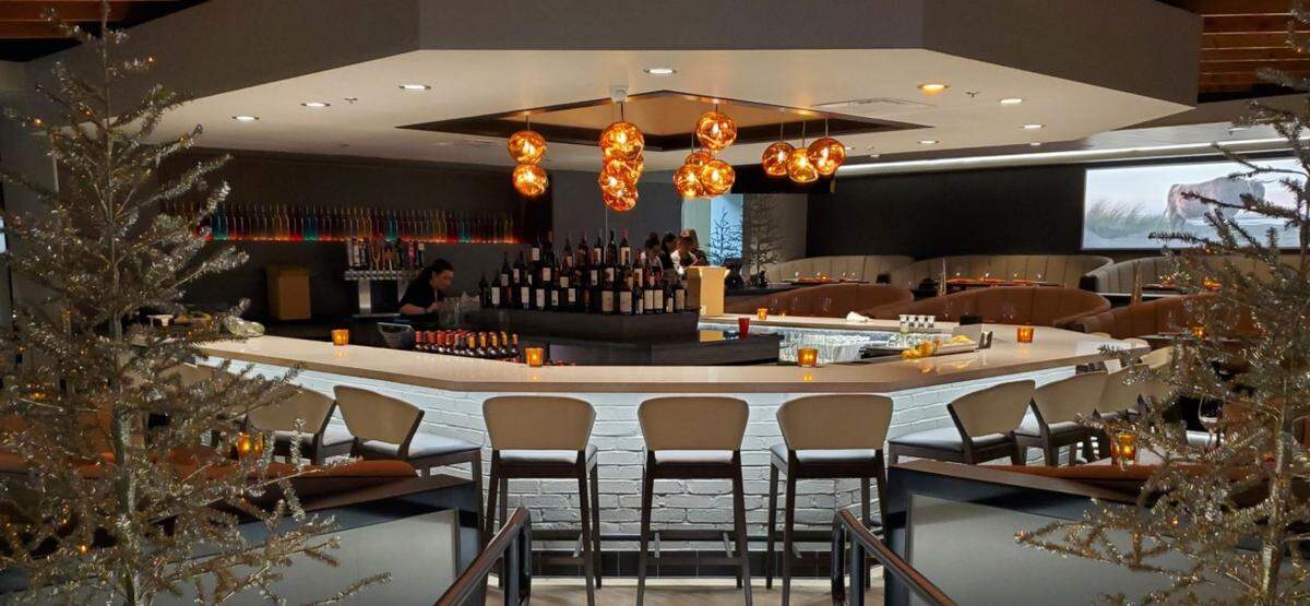 A u-shaped bar anchors the middle of the restaurant.