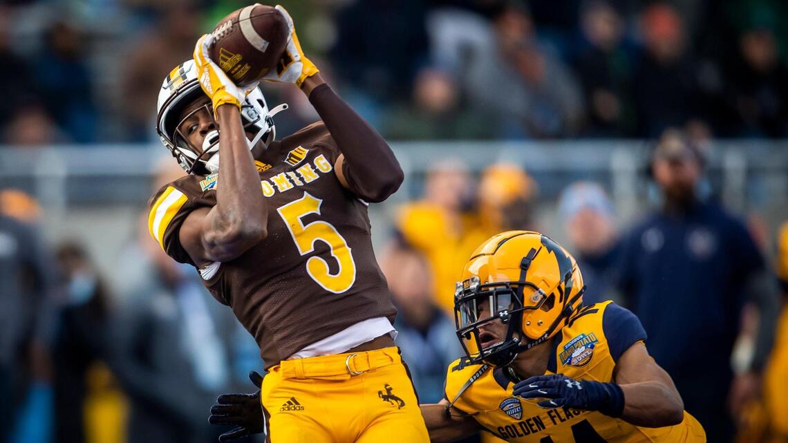 Wyoming, Kent State rewrite Potato Bowl record book as Mountain West’s Cowboys prevail