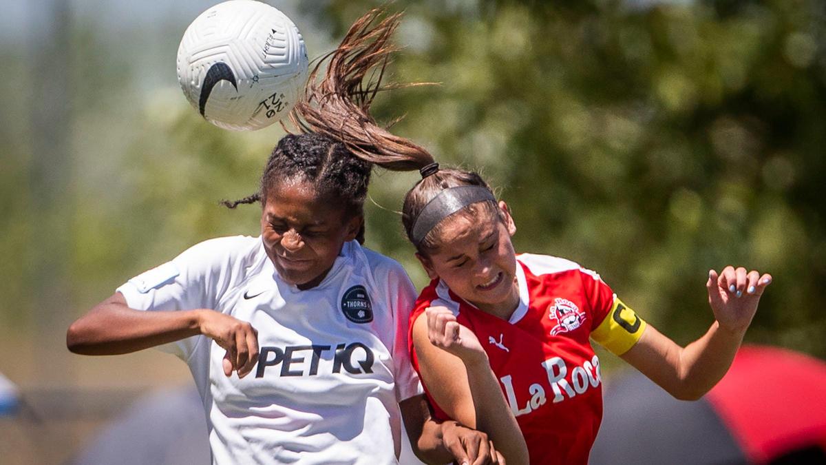 Boise Thorns’ Asia Lawyer, left, rises for a header against Aston Perry from Utah’s La Roca in the U-16 girls championship game Sunday at the U.S. Youth Soccer Far West Regionals at the Simplot Sports Complex in Boise.