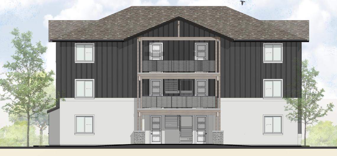 This rendering shows the front of one of the buildings proposed by Darmody Enterprises as part of a 16-unit project at 1428 N. Etheridge Lane. This three-story building is planned to have six units.