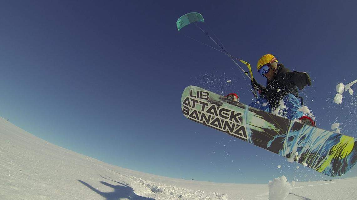 Boisean Will Hise snowkites on the Camas Prairie between Castle Rocks and Hill City. Hise is one of a handful of Idahoans who head to Camas in the winter to snowkite, a sport that involves skiing or snowboarding while being pulled by a kite.