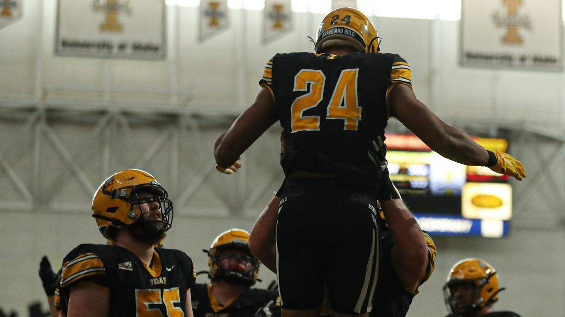 Idaho running back Roshaun Johnson, 24, seen here after scoring against Eastern Washington on Nov. 5, ran for three touchdowns in a 38-7 win against Idaho State in Pocatello on Saturday.