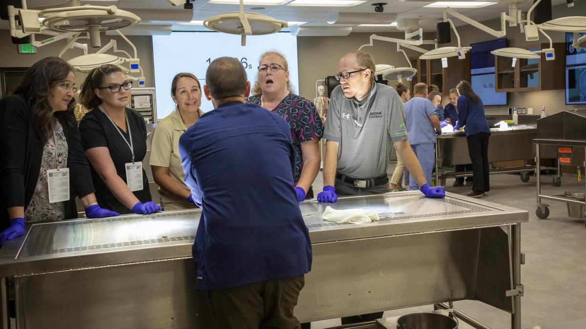 Educators from around the state spend time in Idaho State University’s anatomy lab, taking turns at various stations to learn about joints, lungs and the brain.