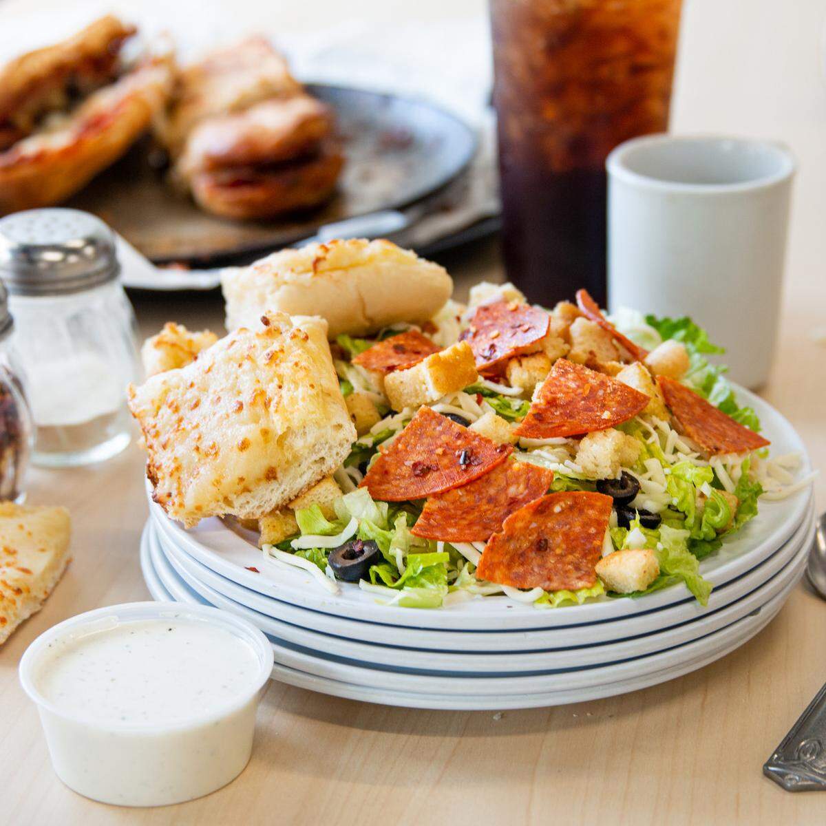 In addition to subs and pizza, the restaurant offers a variety of salads.