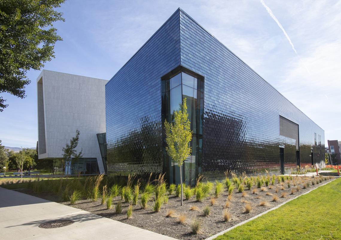 Stainless steel tiles on the two-story gallery and administrative offices side of the Center for the Visual Arts appear black, blue or even gold, depending on the time of day and how the sun strikes the building. That gives the building movement, says James Ogle, director of development for the BSU School of the Arts.