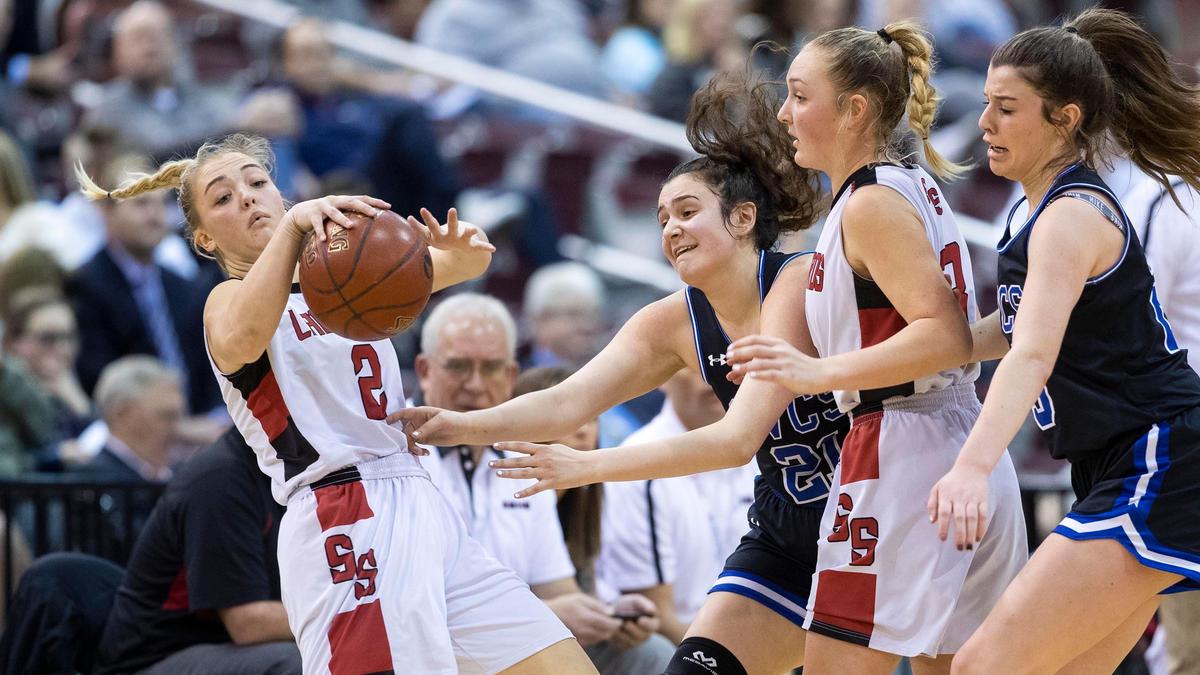 Soda Springs guard Sadie Gronning flies backward after being fouled by Cole Valley Christian’s Savannah Khoury in the 2A state girls basketball championship game Saturday, Feb. 22, 2020 at Ford Idaho Center in Nampa.