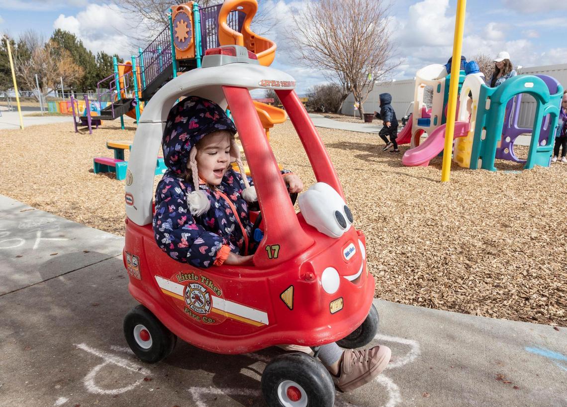 Aurora Coats, 3, plays outside.