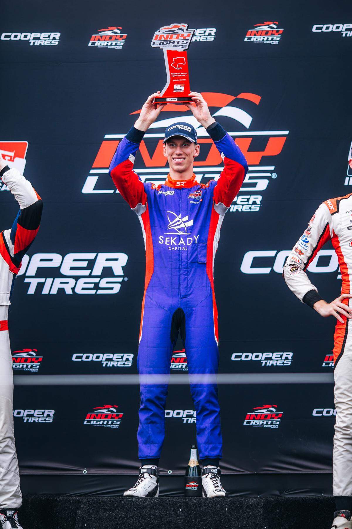 Sting Ray Robb celebrates his first-place finish at the Grand Prix of Monterey at Laguna Seca with Andretti Autosport in 2022.