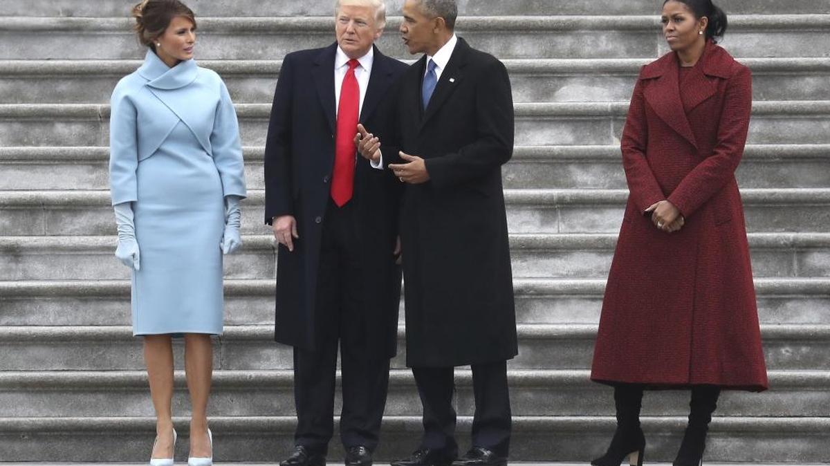 President Donald Trump with first lady Melania and former President Barack Obama with former first lady Michelle Friday on the Capitol steps in Washington.