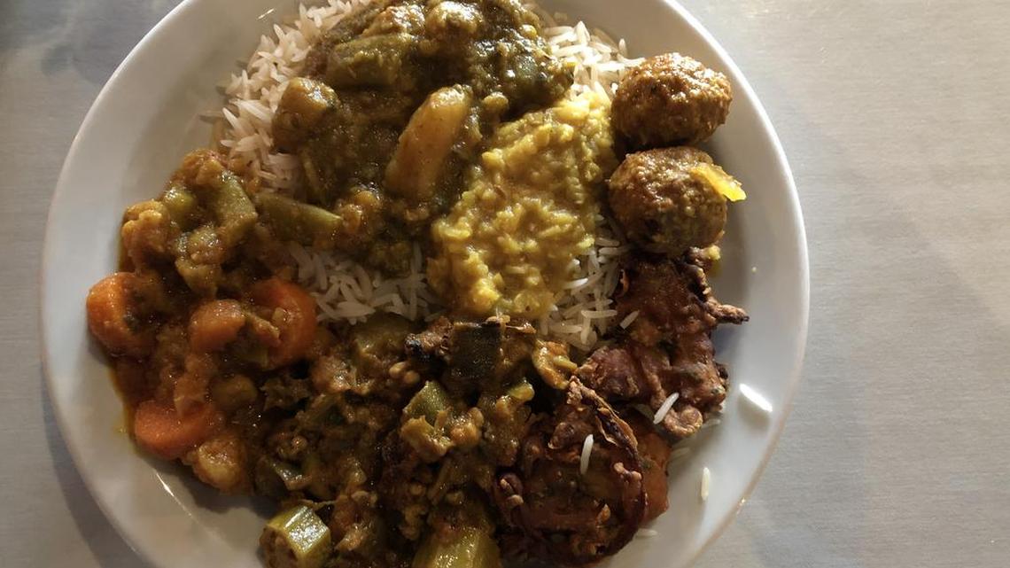 A handsome first plate at Taj Mahal. See if you can spot kofta meatballs and curried okra in the midst of the festivities.