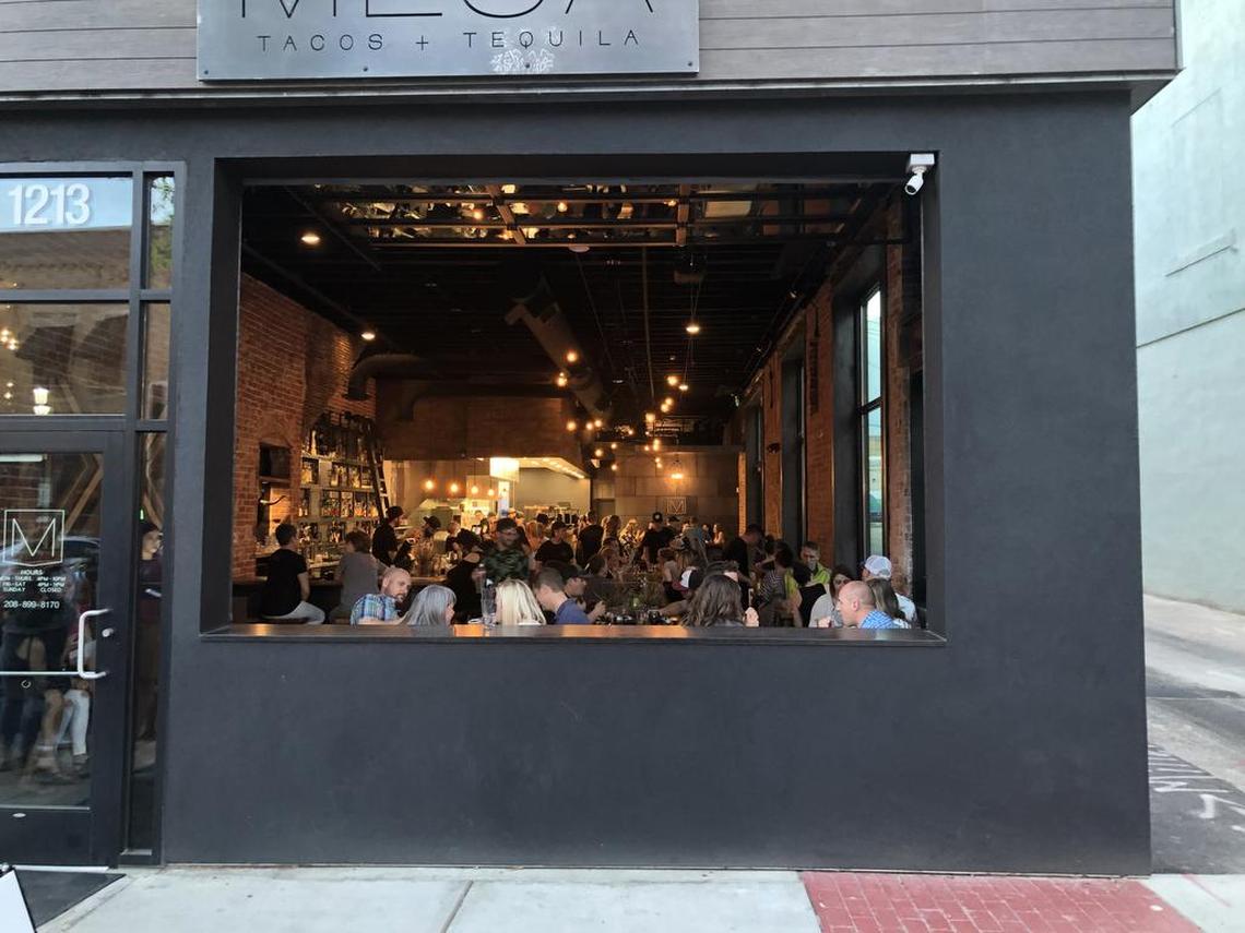 The front window at Mesa rolls up to give diners a breath of fresh air in nice weather.