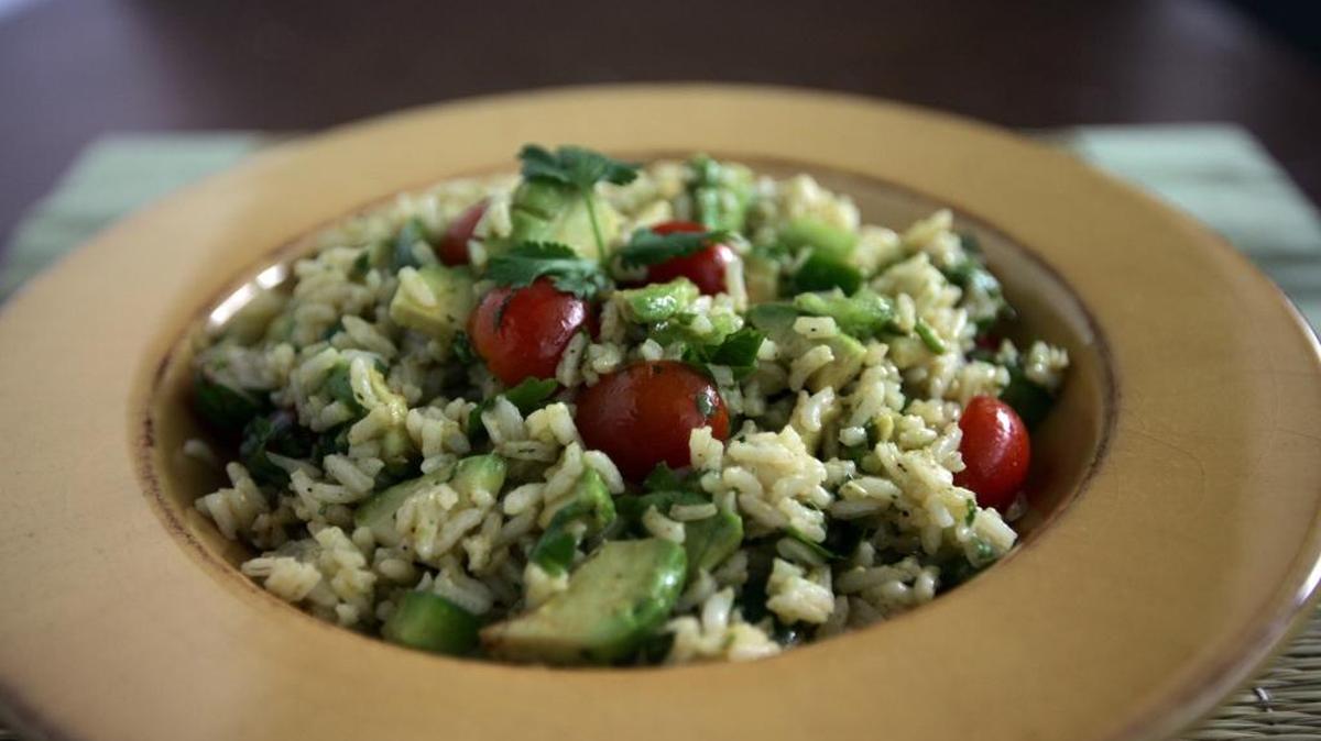 A file image of Rice Salad with Avocado and Grape Tomatoes, which is a breeze to make.