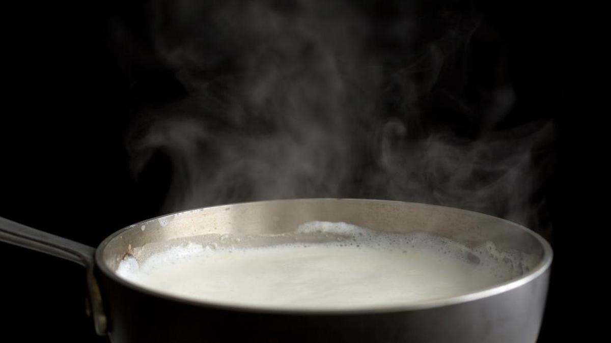 Steaming the milk.