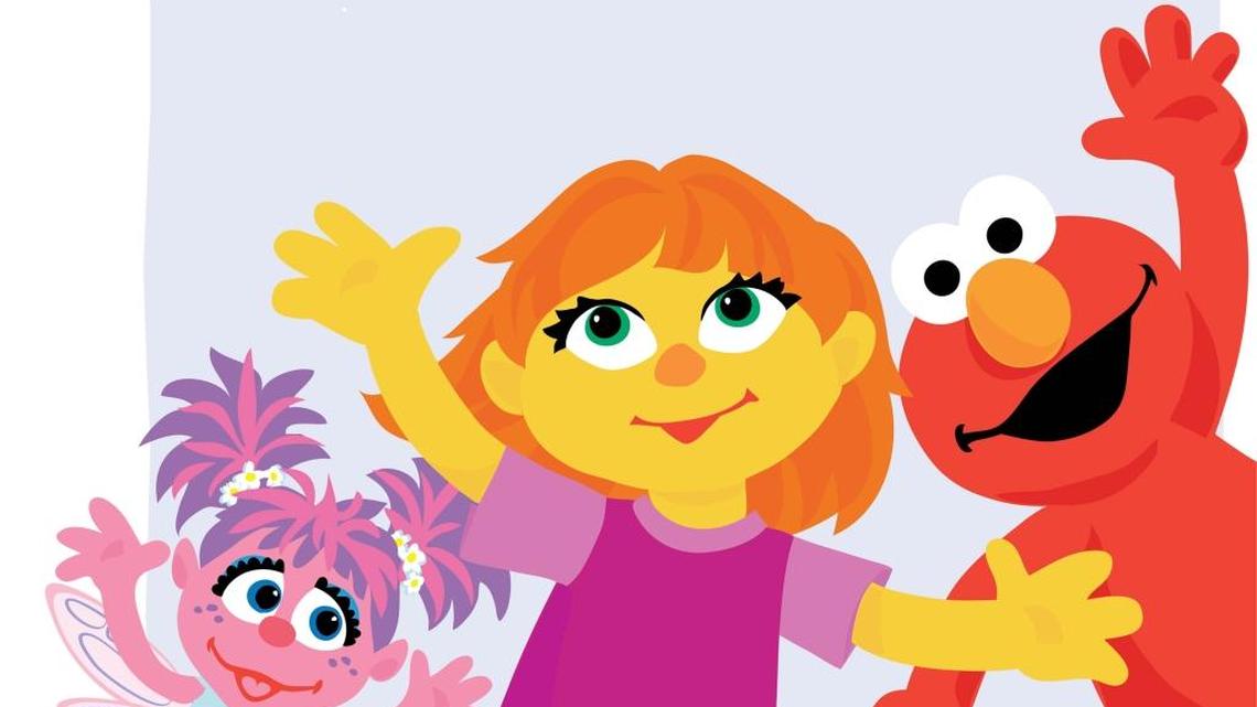 Julia, center, is Sesame Street’s newest muppet, an autistic little girl.