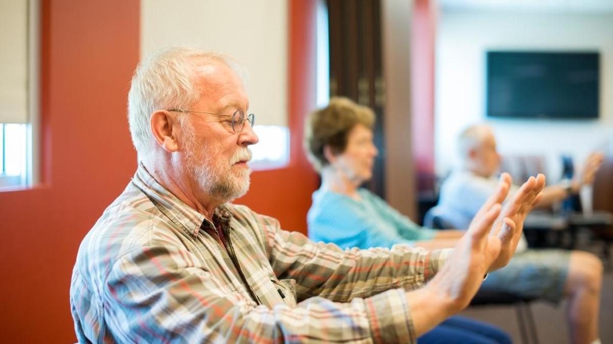 Cancer patients and caregivers participate in a gentle yoga class at St. Luke’s Mountain States Tumor Institute. MSTI offers many classes and support groups for cancer patients and families.