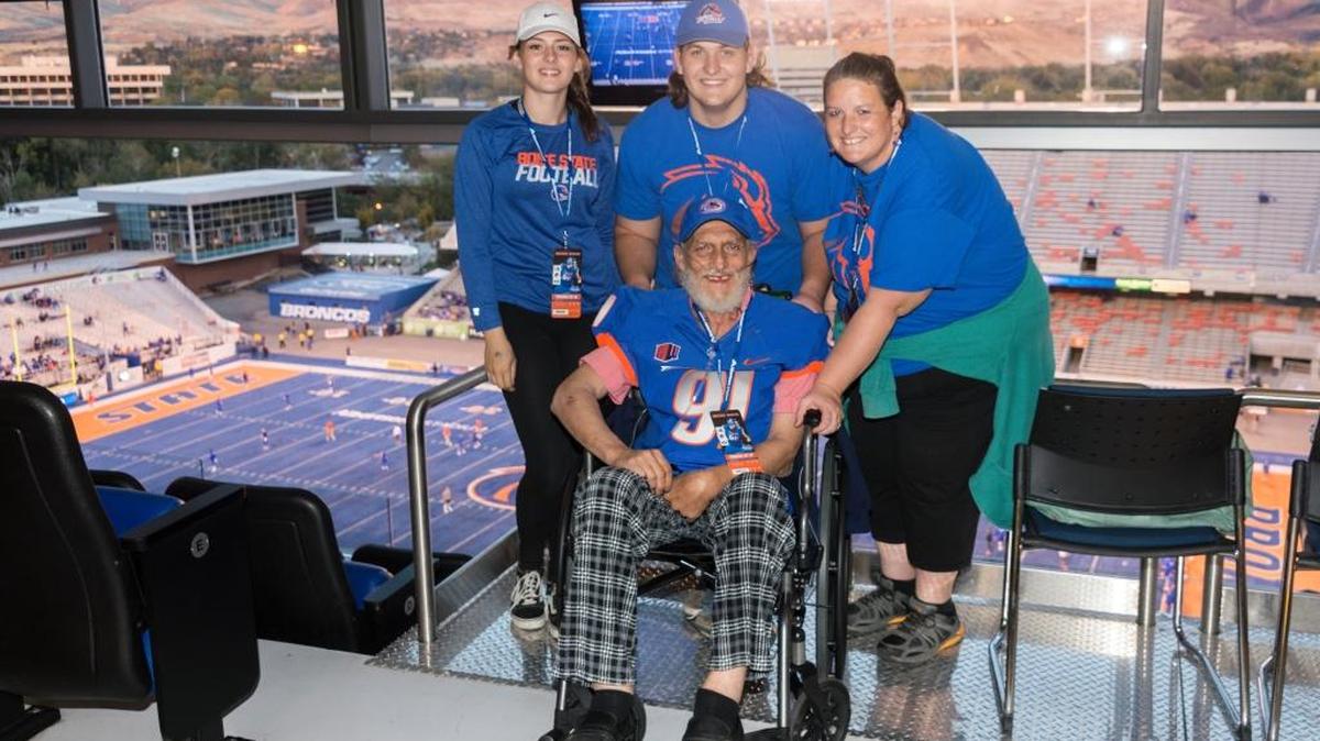 DeWayne Wadsworth prepares to watch the Boise State-BYU Oct. 20. With him to watch the game in the Stueckle Sky Center are his daughter Michele Alidjani, grandson Alex Wood and granddaughter Marissa Jones.
