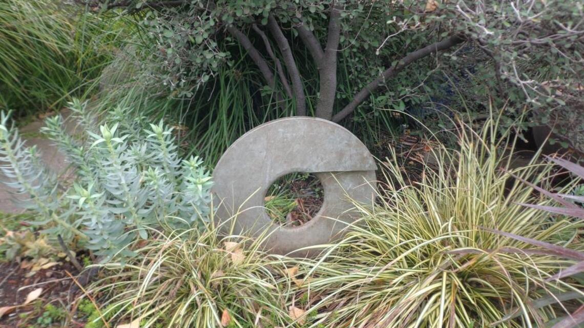 Standing disks add circle-of-life element to your garden