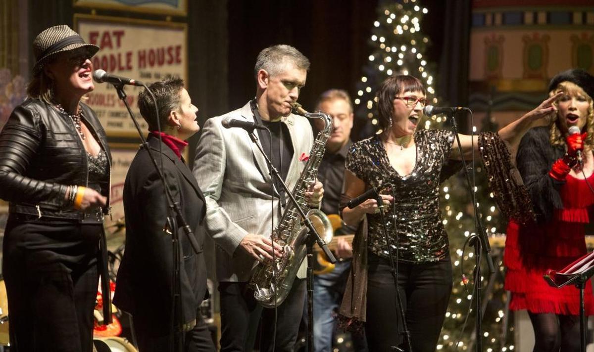 The Divas of Boise, regulars at Xtreme Holiday Xtravaganza, join Curtis Stigers on stage at The Egyptian.