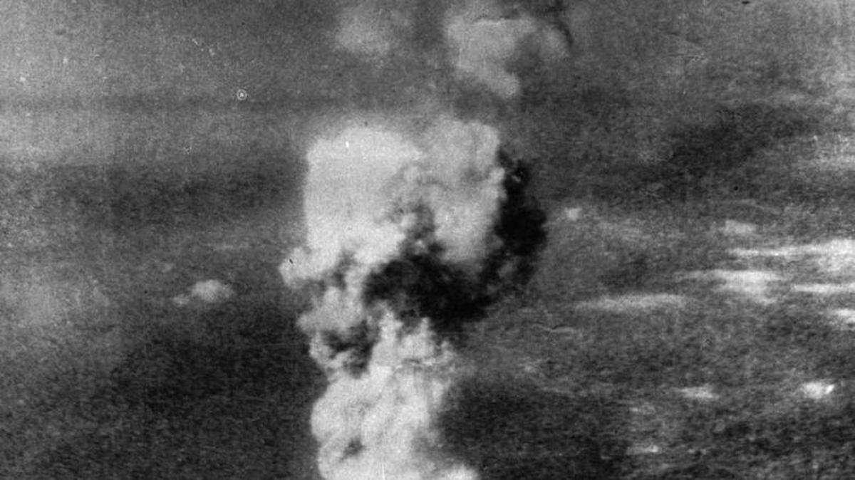 A column of smoke rises 20,000 feet over Hiroshima after the 9,000-pound “Little Boy” atomic bomb was released. This photo was made Aug. 6, 1945, by George R. “Bob” Caron, a tailgunner on the bomber Enola Gay.